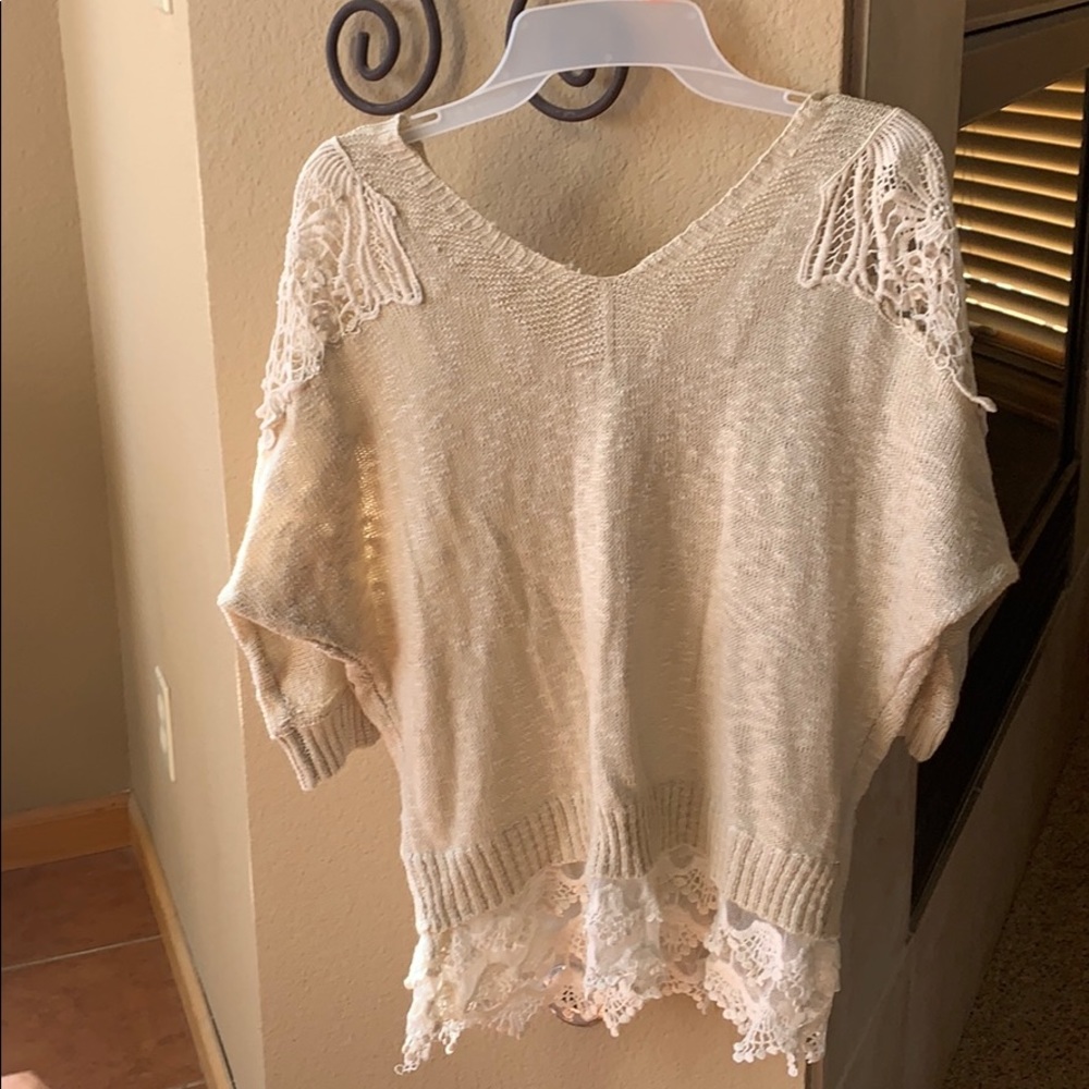 Cream sweater with lace bottom